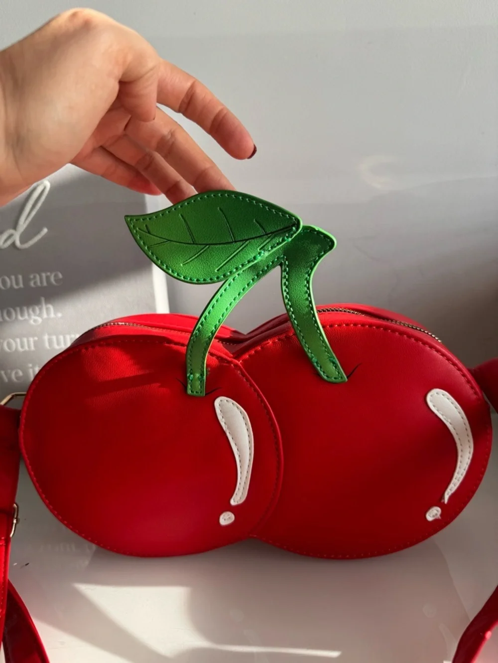 Red Cherry Crossbody Bag with Green Leaf Accent